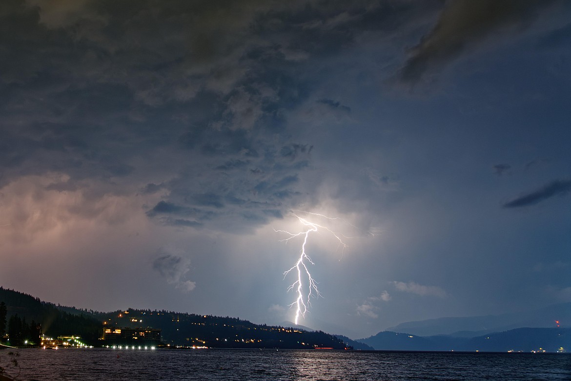 A lightning strike looking East over Coeur d'Alene Lake toward 4th of July Pass on Friday night. Photo by James Fillmore