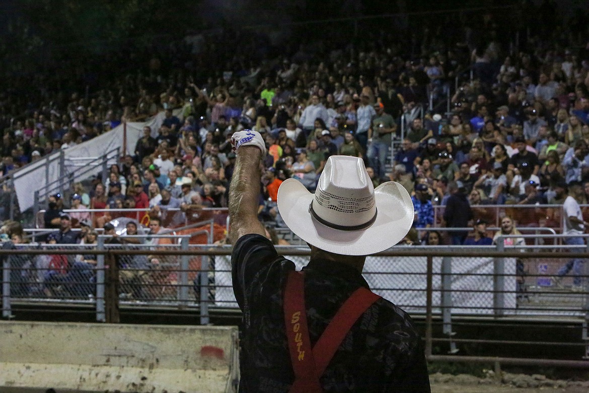 Rodeo clown J.W. Winklepleck amps up the crowd on Aug. 18 at the Northwest Ag Demolition Derby at the Grant County Fairgrounds.