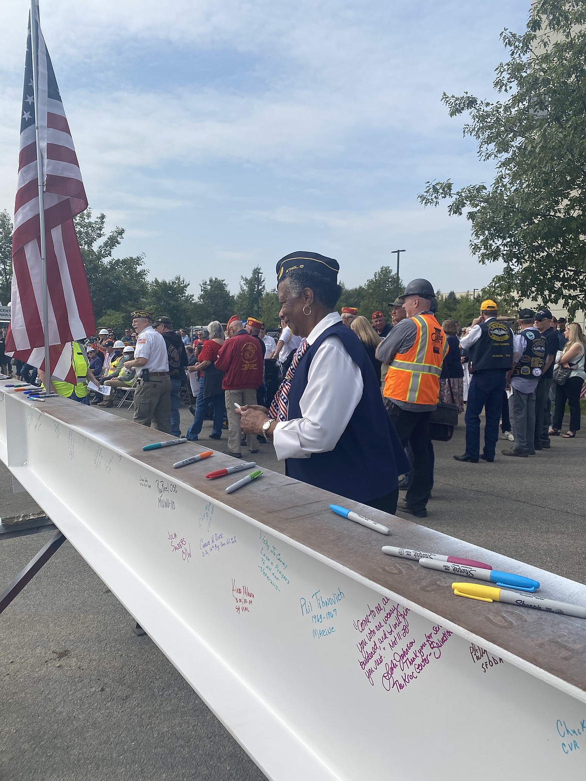 Gloria Robinson was one of hundreds who gathered Thursday to sign the Topping Off beam celebrating the Post Falls Veterans Home, on track for completion in the fall of 2022.