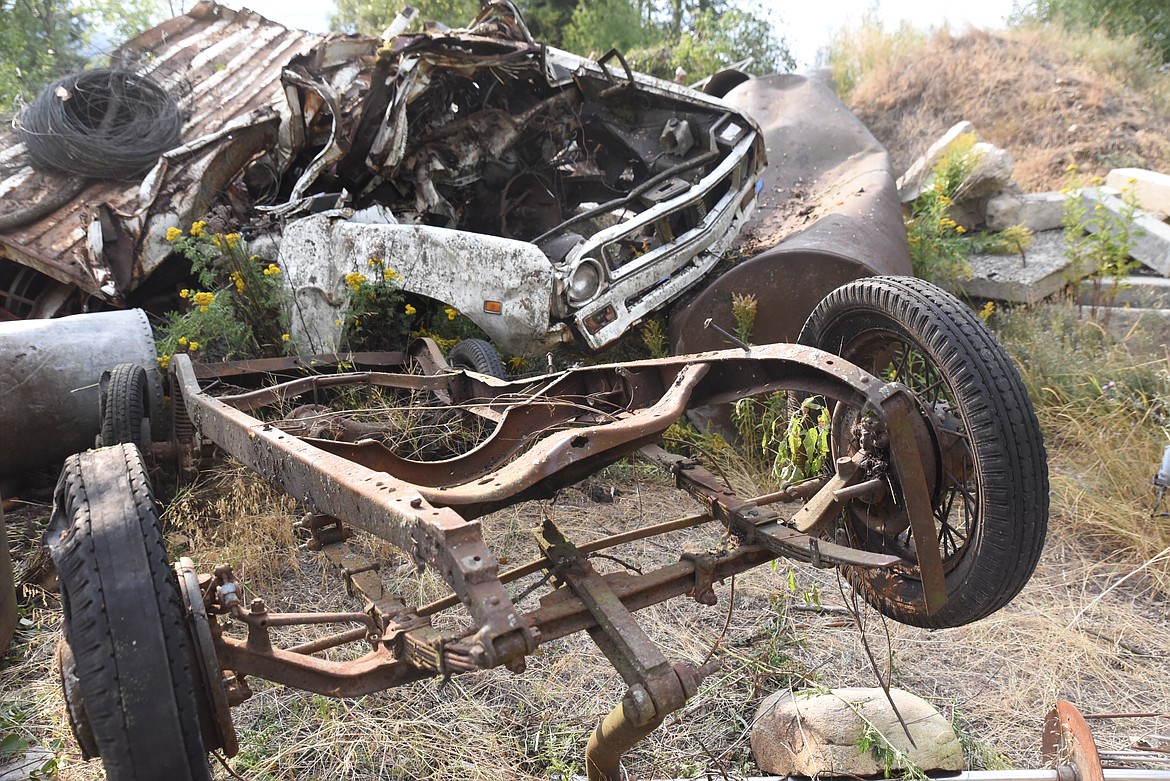 Piles of debris are stacked up on public land off of City Service Road in Libby. (Derrick Perkins/The Western News)