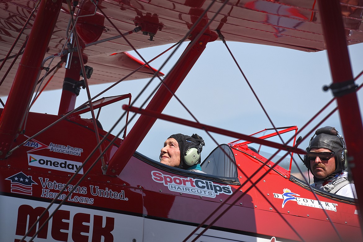 Kenneth Schrammeck, 98, looks to the skies shortly before he and Dream Flights pilot Clint Cawley take off in a Boeing-Stearman Model 75 biplane at Glacier International Airport on Thursday, Aug. 26, 2021. The flight was part of nonprofit Dream Flights' Operation September Freedom, which honors World War II veterans. (Jeremy Weber/Daily Inter Lake)
