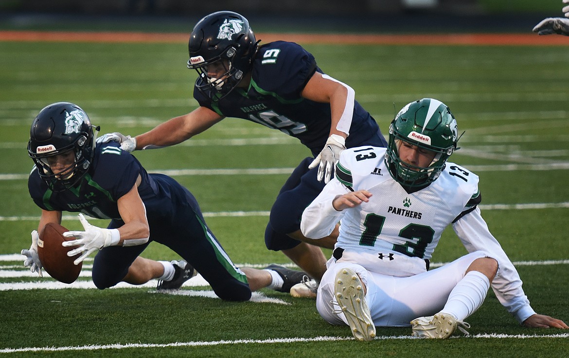 Glacier's Joe Limberis (11) looks to come up with a loose ball in the first quarter of the Wolfpack's 52-0 win over Belgrade at Legends Stadium Friday. (Jeremy Weber/Daily Inter Lake)