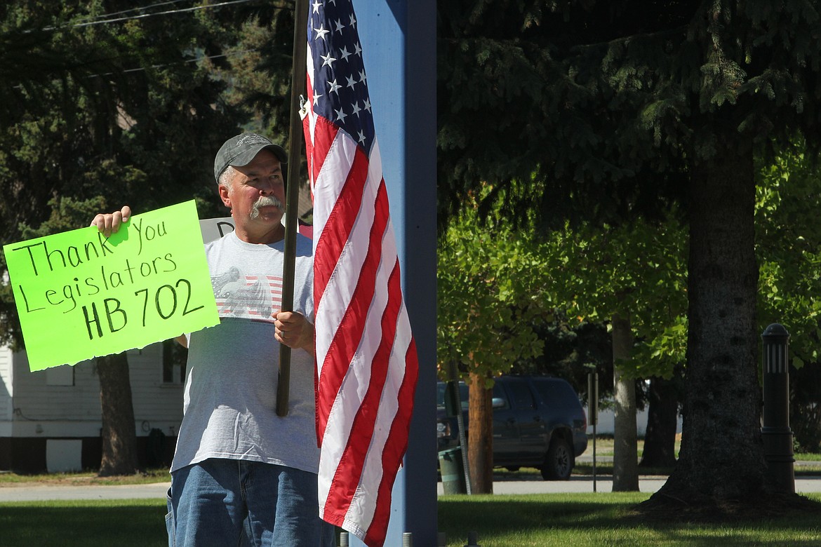 Demonstrators showed their support for House Bill 702 in front of the Lincoln County courthouse on Aug. 28. (Will Langhorne/The Western News)
