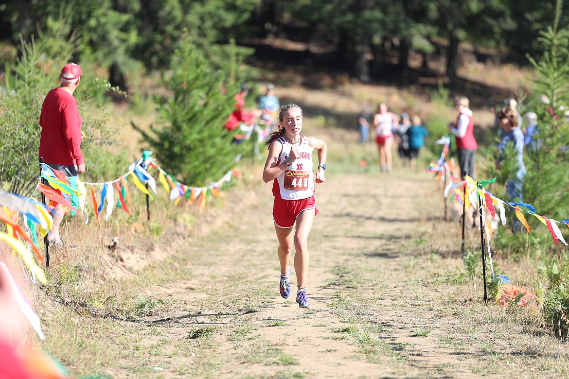 Grace Rookey digs deep as she nears the finish line.