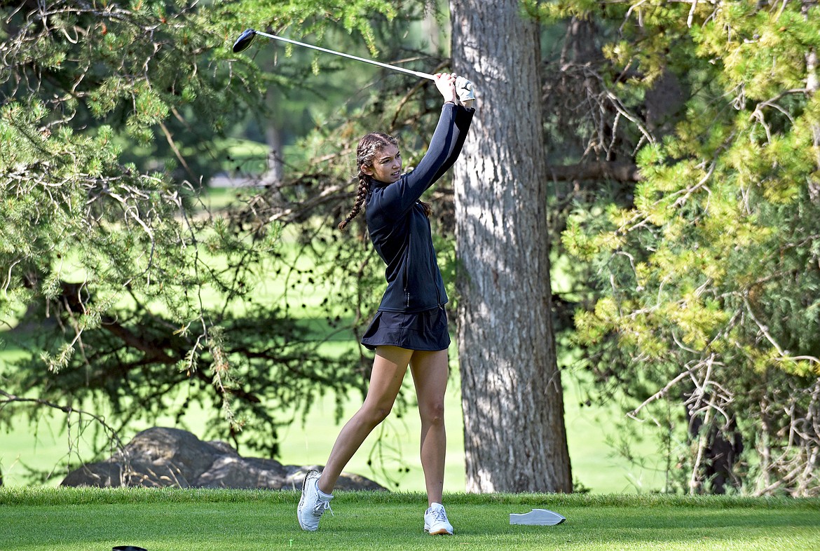 Whitefish golfer Anyah Cripe tees off at Whitefish Lake Golf Course during the Western A Kickoff tournament on Monday, Aug. 23. (Whitney England/Whitefish Pilot)