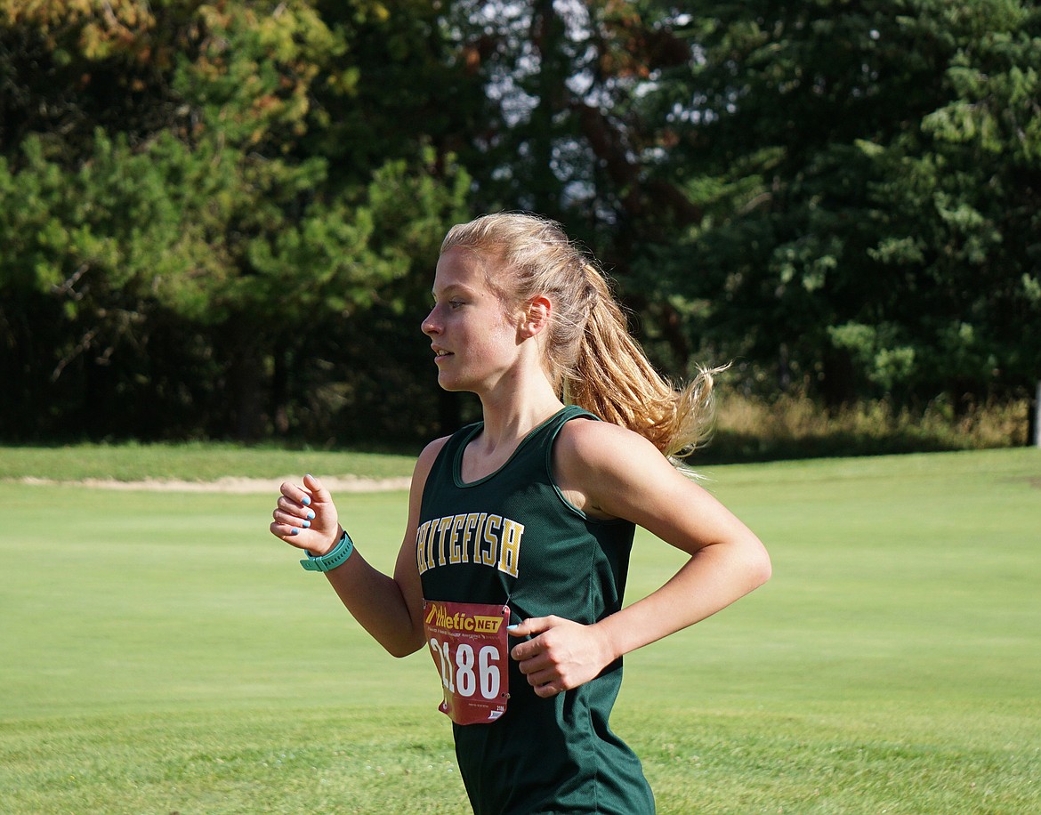 Whitefish sophomore Morgan Grube placed fifth in women’s varsity 5,000 meters with a time of 21:44.96 Friday at the cross country meet in Libby. (Matt Weller photo)