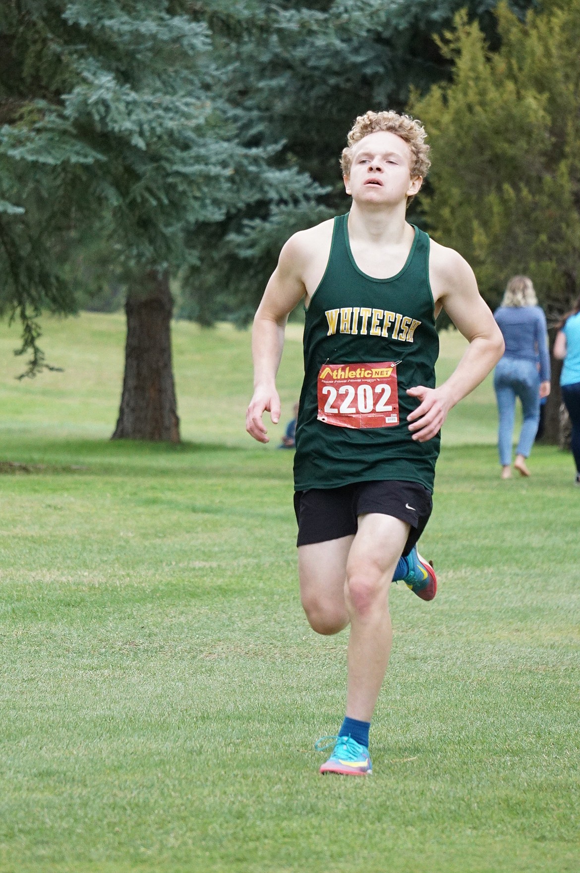 Whitefish junior Jack McDaniel finished in the top three for junior varsity Friday at the cross country meet in Libby. (Matt Weller photo)