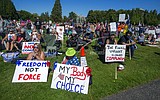As districts insist on vaccines, some teachers push back