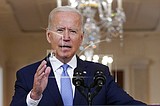 Biden defends departure from 'forever war,' praises airlift