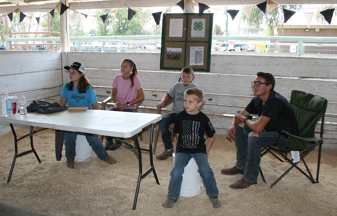 MOSES LAKE — The 2021 Grant County Fair got two thumbs up from Easton Sutor. 
Sutor, of Royal City, was among the kids exhibiting animals at the fair, which turned out to be a pretty normal fair in times anything but normal.