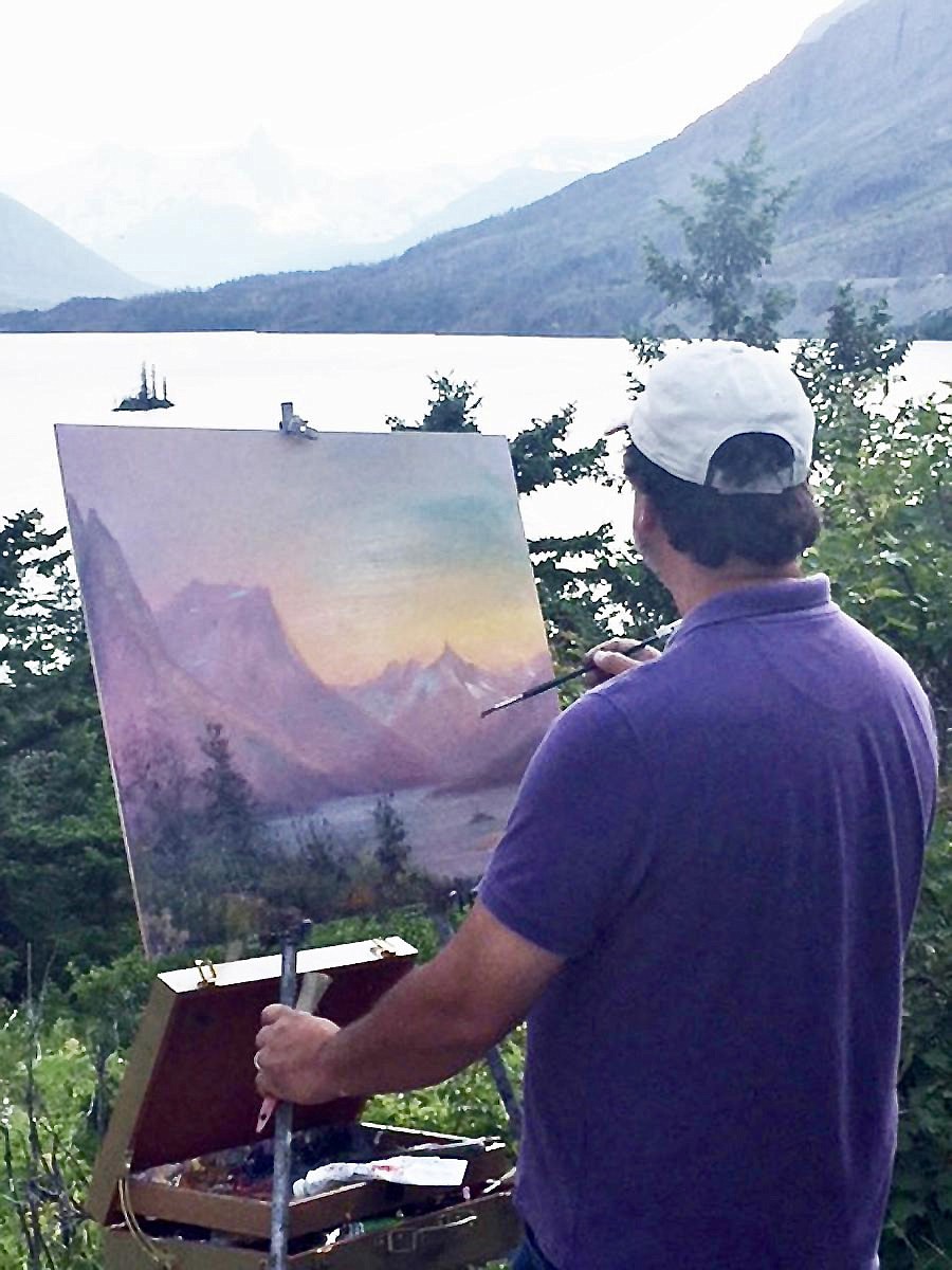 Local artist Nicholas Oberling paints a scene en plein air.