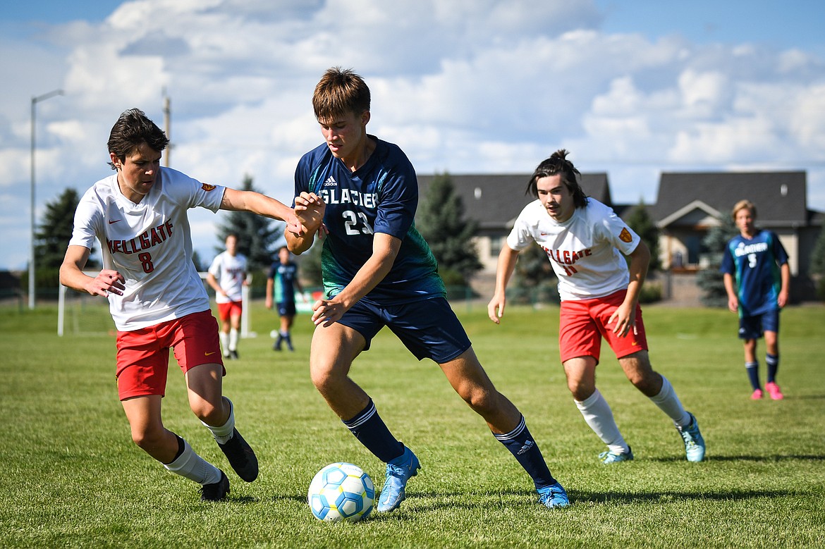 Glacier's Joey Paolini (23) pushes the ball upfield against Missoula Hellgate at Glacier High School on Thursday, Sept. 2. (Casey Kreider/Daily Inter Lake)