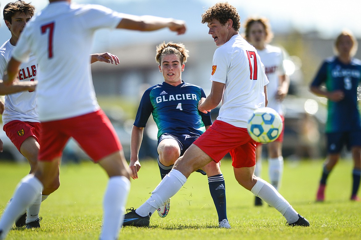 Glacier's Harrison Sanders (4) looks to pass through the defense of Missoula Hellgate at Glacier High School on Thursday, Sept. 2. (Casey Kreider/Daily Inter Lake)