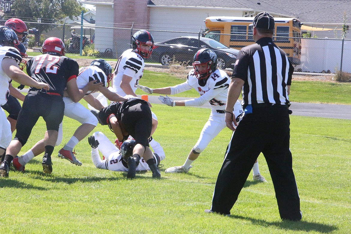 A referee watches the action on the field in Ritzville on Saturday, at the preseason jamboree hosted by Lind-Ritzville/Sprague High School.