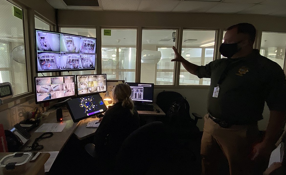 Kootenai County Sheriff's Office staff keep an eye on the cameras that keep watch over jail inmates. (MADISON HARDY/Press)