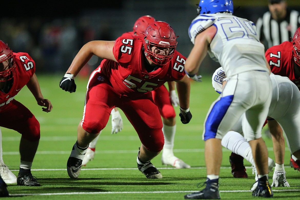 Offensive lineman Carson Laybourne prepares to make a block on Friday.