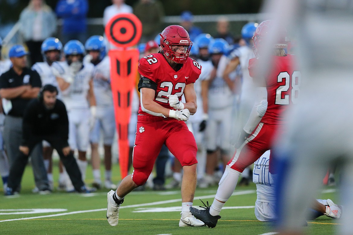 Wes Benefield celebrates after sacking the Coeur d'Alene quarterback.