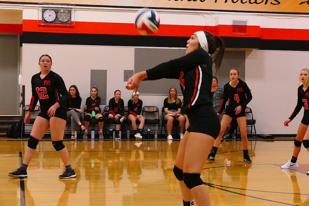 Plains' Lexa Craft sets a shot for a teammate during Saturday afternoon's match against Arlee. (Chuck Bandel/Valley Press)