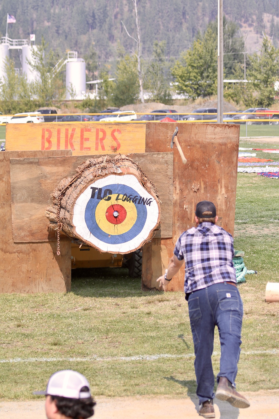 Kerry Cox of Hayden competes in the men's ax throwing at the Paul Bunyan Days logging competition at St. Maries City Park on Sunday. HANNAH NEFF/Press