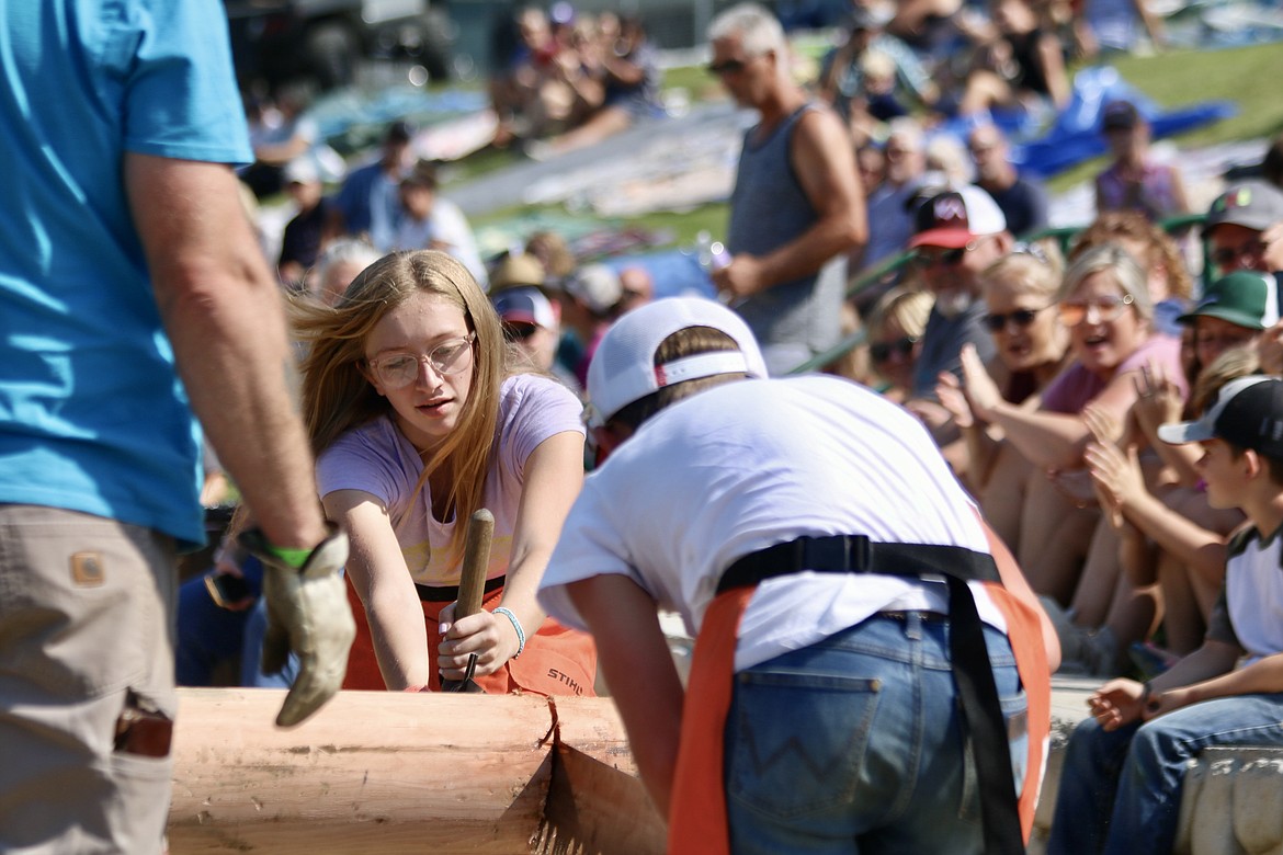 Kyla Cox, 13, from Hayden competed for the first time in the teen cross-cut competition with partner Colton Schmit, 13, of Hayden at the Paul Bunyan Days logging competition at St. Maries City Park on Sunday. HANNAH NEFF/Press