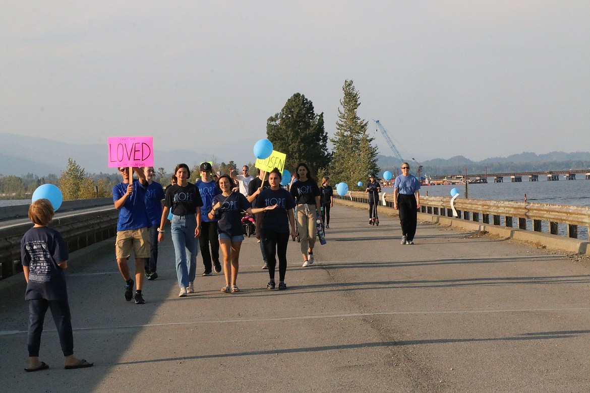 Participants take part in the 2021 Walk for HOPE on Sunday.