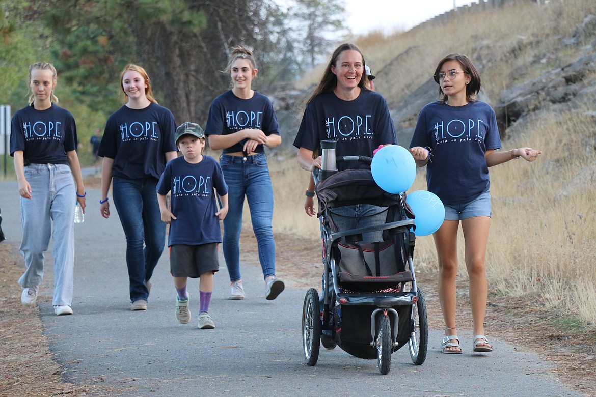 Participants take part in the 2021 Walk for HOPE on Sunday.