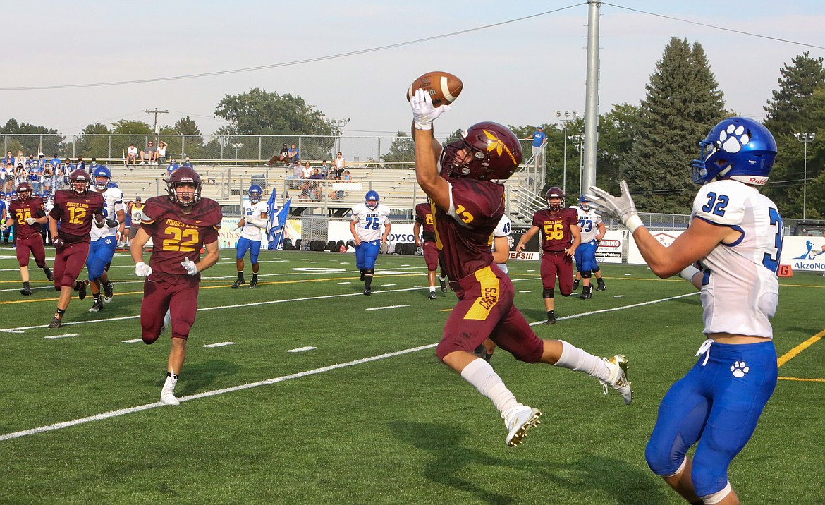 Moses Lake’s Hayden Throneberry intercepts a pass from the Bothell quarterback on 4th and goal in the first half on Saturday in Moses Lake