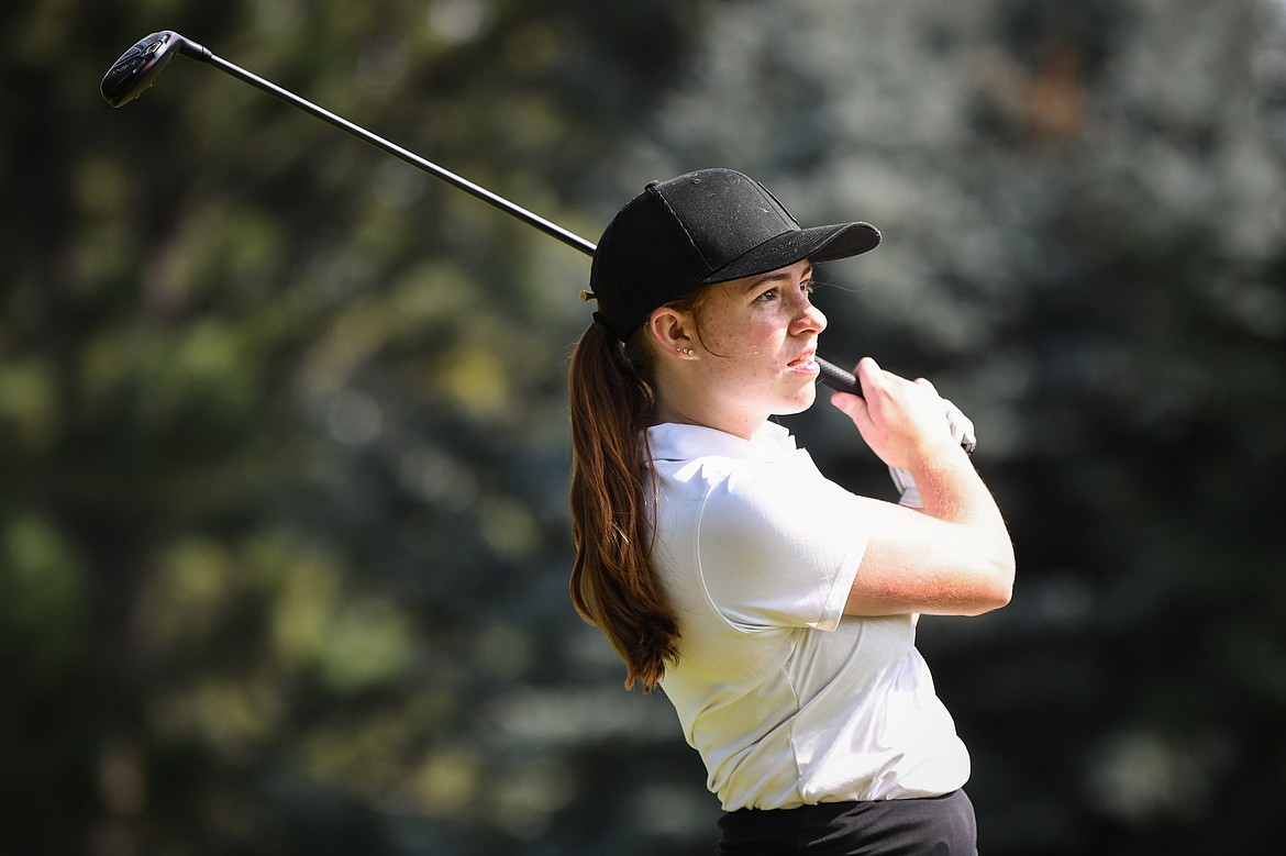 Flathead's Jillian Wynne watches her tee shot on the fifth hole of the South Course during the Whitefish Triangular at Whitefish Lake Golf Club on Tuesday, Sept. 7. (Casey Kreider/Daily Inter Lake)