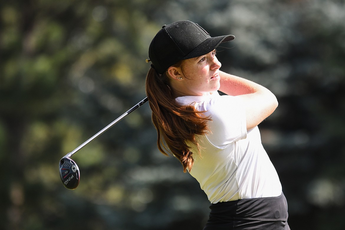 Flathead's Jillian Wynne watches her tee shot on the fifth hole of the South Course during the Whitefish Triangular at Whitefish Lake Golf Club on Tuesday, Sept. 7. (Casey Kreider/Daily Inter Lake)