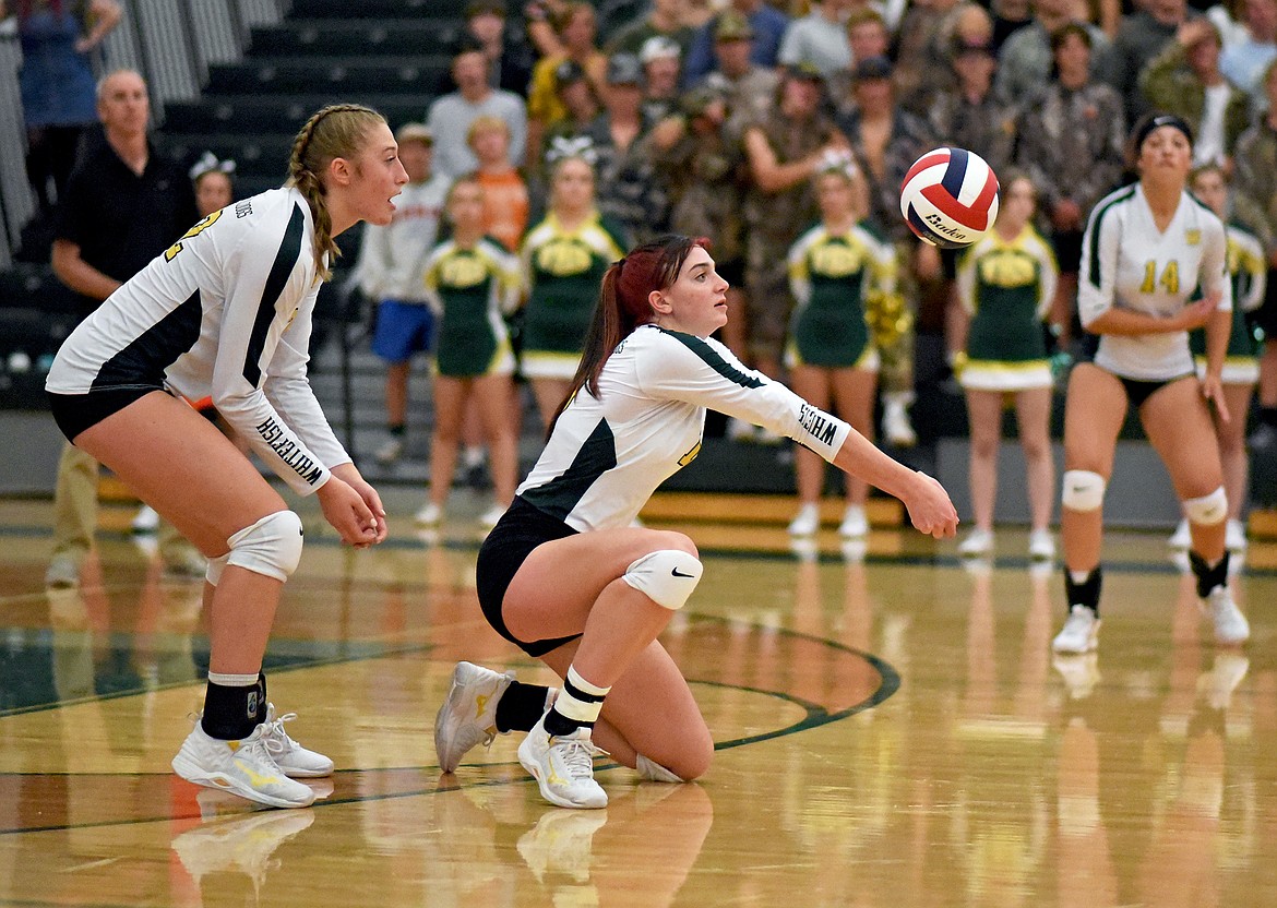 Whitefish senior Jadi Walburn kneels to receive a serve in a match against Frenchtown in Whitefish on Thursday. (Whitney England/Whitefish Pilot)