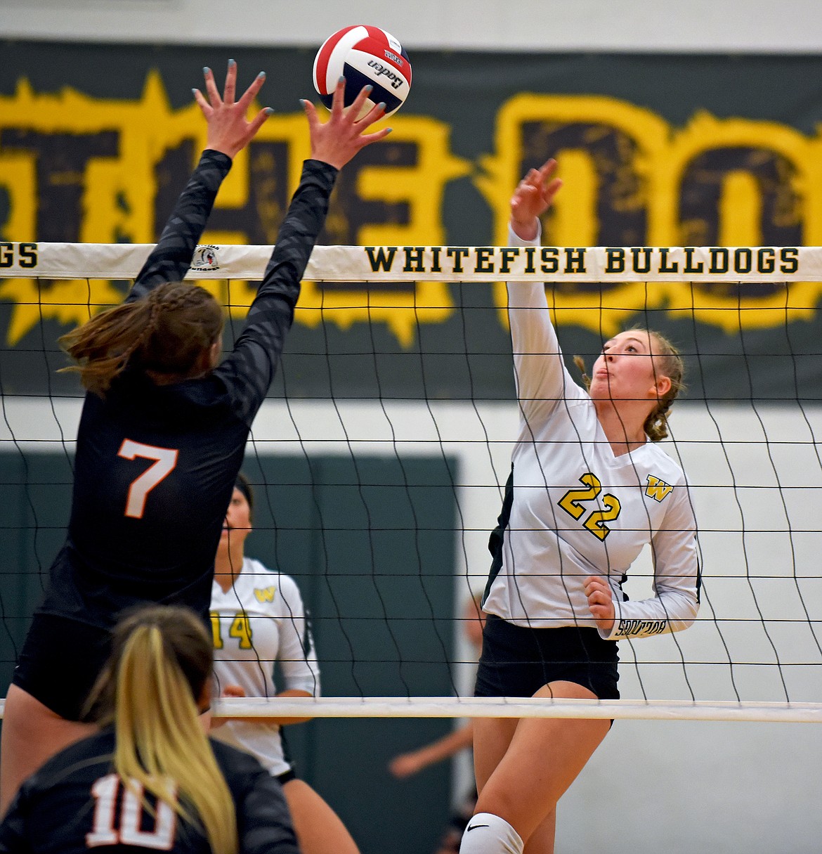 Lady Bulldog sophomore Brooke Zetooney hits the ball over the net in a match against Frenchtown in Whitefish on Thursday. (Whitney England/Whitefish Pilot)