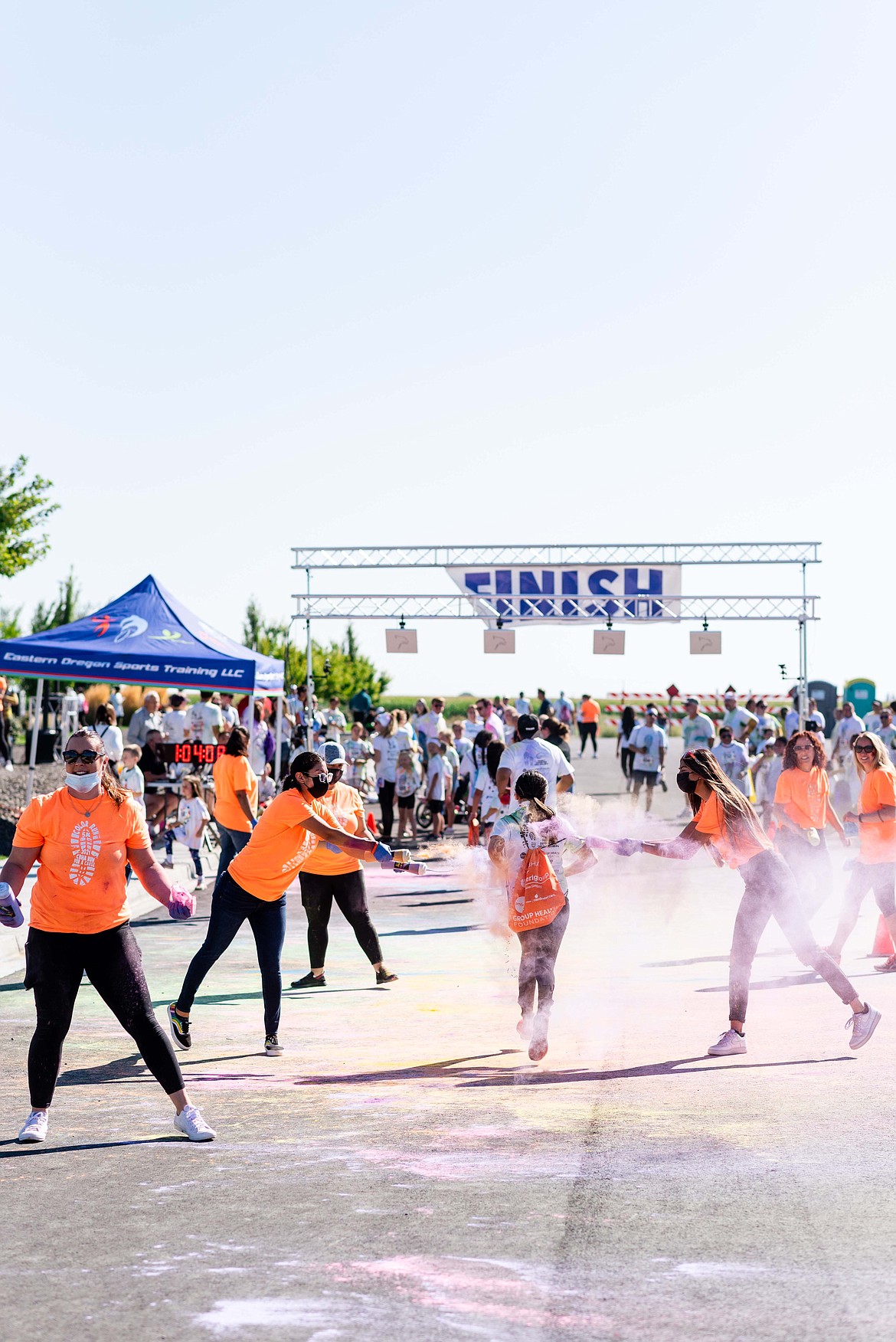 Runners get a shot of purple during the Columbia Basin Health Association Run for a Cause 5K Color Run Aug. 28 in Othello.