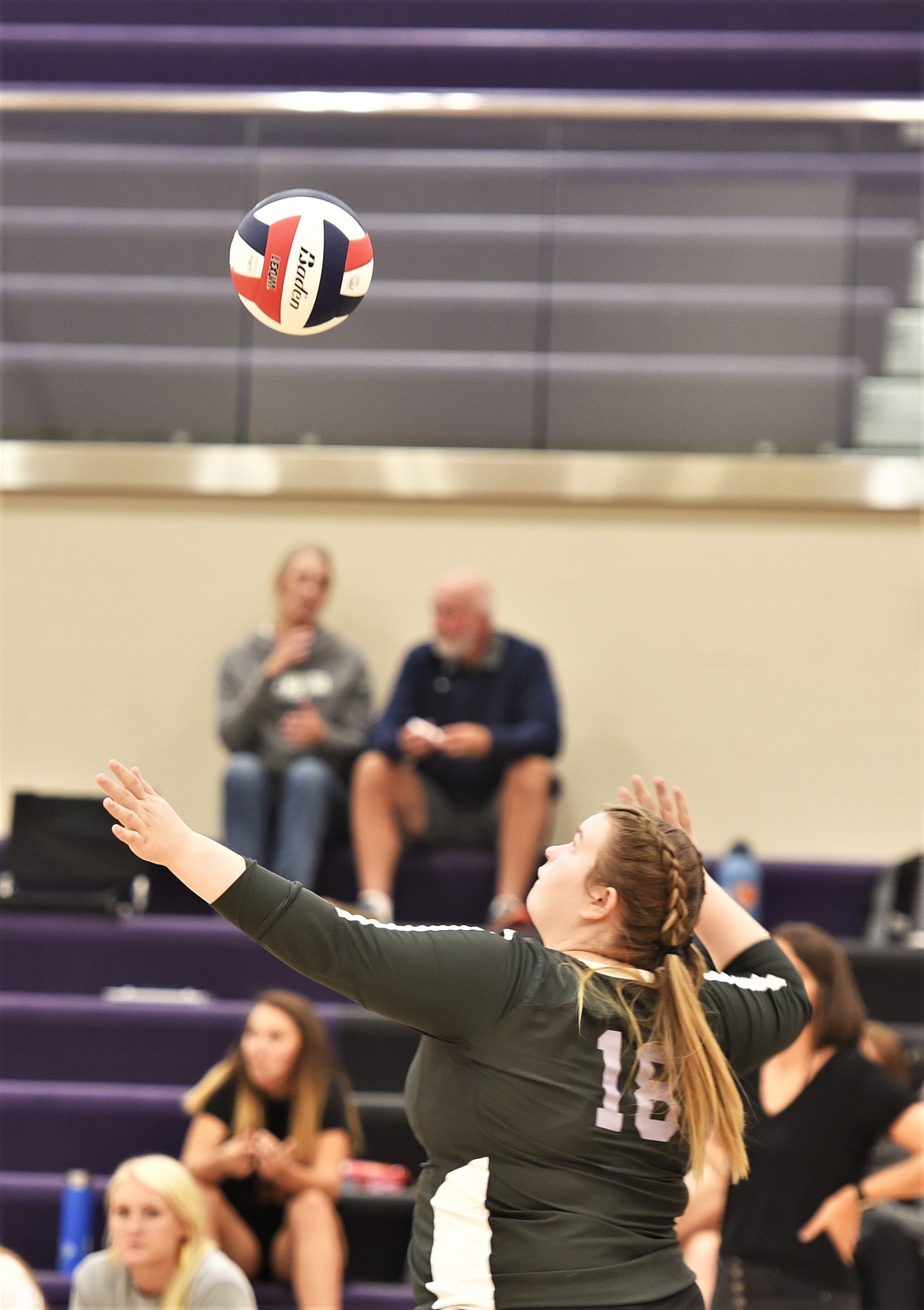 Senior Kamdyn Burrough serves against Stevensville. (Scot Heisel/Lake County Leader)