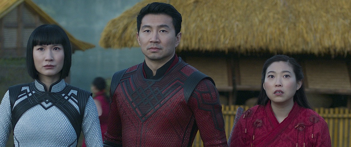 This image released by Marvel Studios shows Meng'er Zhang, Simu Liu and Awkwafina in a scene from "Shang-Chi and the Legend of the Ten Rings."