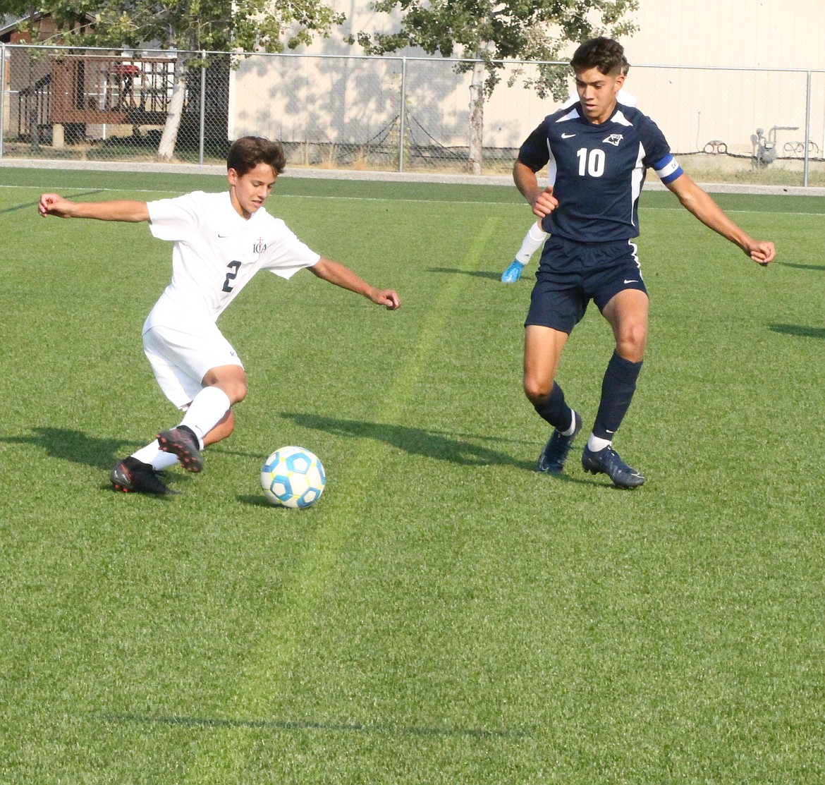 JASON ELLIOTT/Press
Immaculate Conception's Demetrius Melnick plays the ball up the field during Wednesday's match against Coeur d'Alene Charter at The Fields at Real Life in Post Falls.