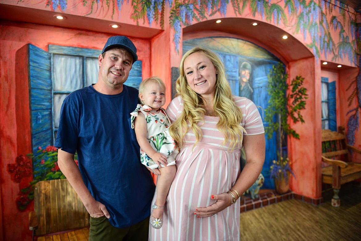 Kyle and Madisen Duty with their daughter Grace at Huck's Place Ginger Brew and Juice Bar in Whitefish on Wednesday, Sept. 8. (Casey Kreider/Daily Inter Lake)