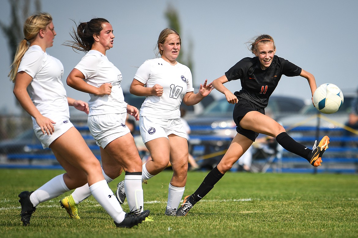 Flathead's Mia Stephan (11) has her shot glance off the goal post in the second half against Butte at Kidsports Complex on Thursday, Sept. 9. Stephan would score a goal less than two minutes later. (Casey Kreider/Daily Inter Lake)