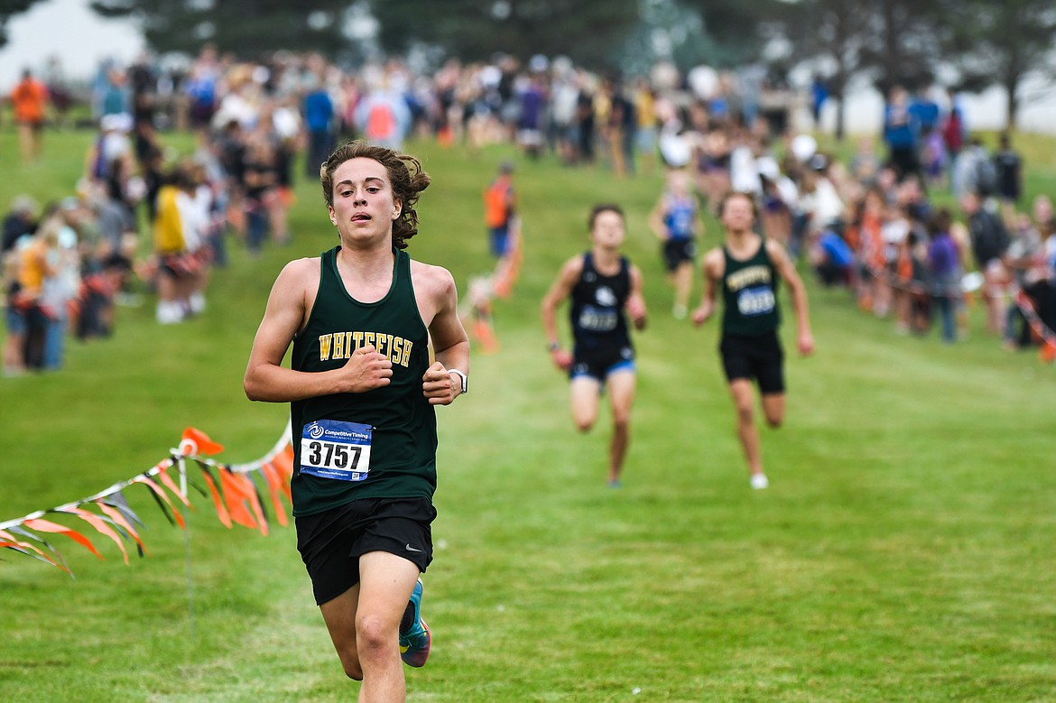 Whitefish's Deneb Linton crosses the finish line in ninth place with a time of 16:56.17 at the Flathead Invite at Rebecca Farm on Friday, Sept. 10. (Casey Kreider/Daily Inter Lake)