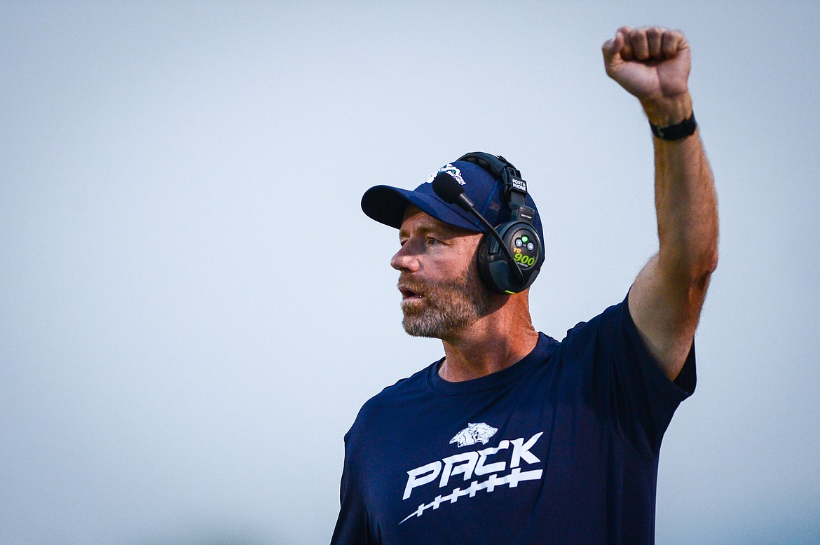 Glacier head coach Grady Bennett motions to the Wolfpack as they take on Missoula Big Sky at Legends Stadium on Friday, Sept. 10. (Casey Kreider/Daily Inter Lake)