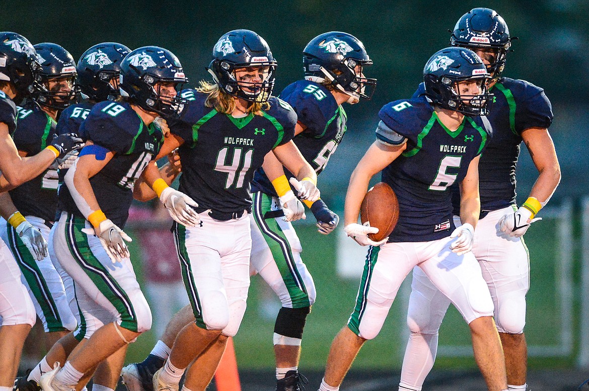 Glacier defensive back Kash Goicoechea (6) celebrates with teammates after returning an interception for a touchdown in the second quarter against Missoula Big Sky at Legends Stadium on Friday, Sept. 10. (Casey Kreider/Daily Inter Lake)