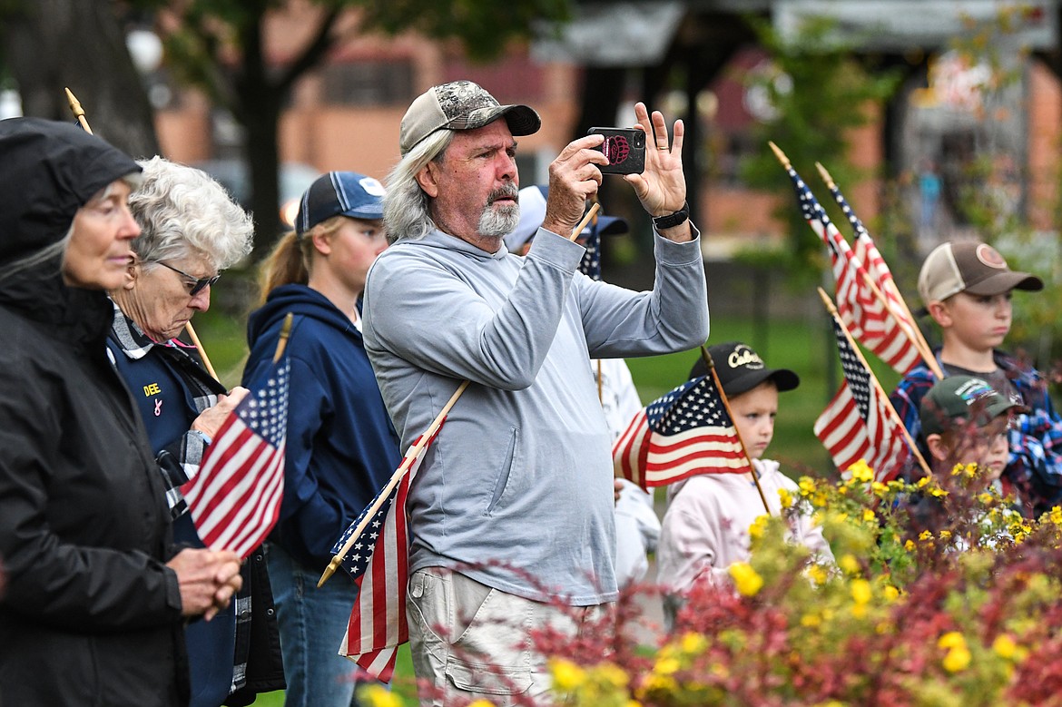 People gather at Depot Park during a commemorative ceremony at the Kalispell American Legion Post 137's 9/11 Freedom Walk on Saturday, Sept. 11. (Casey Kreider/Daily Inter Lake)