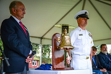 Master Chief Timothy Baldwin, right, of the future nuclear-powered fast attack submarine U.S.S. Montana (SSN 794) that will join the Navy fleet in 2022, performs an honor-ringing of the ship's bell with Dr. Bill Whitsitt, Chairman of the U.S.S. Montana Committee, at the 9/11 Honor & Serve Foundation's 20-year Remembrance Ceremony at Wrangler Springs Ranch in Bigfork on Saturday, Sept. 11, 2021. (Casey Kreider/Daily Inter Lake)