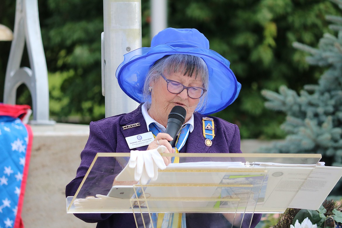 Sandra Coultrap, President of the Edward Carleton Chapter, NSCDXVIIc, opens the ceremony to commemorate the 100th anniversary of The Tomb of the Unknown Soldier at the Veterans Memorial in McEuen Park in downtown Coeur d’Alene on Saturday. HANNAH NEFF/Press