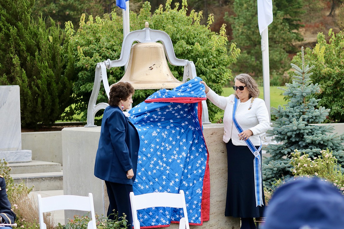 A plaque to commemorate the 100th anniversary of The Tomb of the Unknown Solder is unveiled at Veterans Memorial in McEuen Park on Saturday by Rae Anna Victor, Project Patriot Chair, NSDAR, left, and Elizabeth Jones, Honorary Idaho State Regent of the National Society Daughters of the American Revolution. HANNAH NEFF/Press