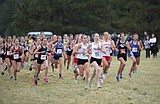 PREP ROUNDUP: Post Falls' Wood, Coeur d'Alene boys run to victories at Farragut meet