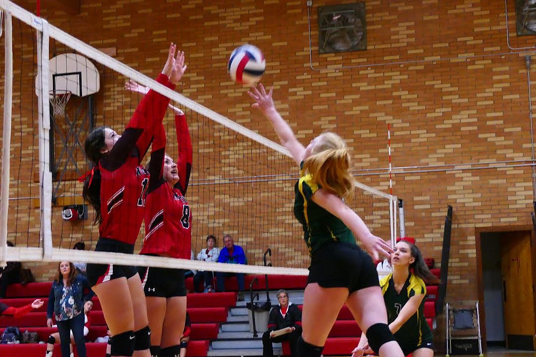 St. Regis' Karmen Alexander tries to get a shot past two Noxon defenders, including Riley Richter (4), who had a big statistical night in the Lady Red Devils win. (Chuck Bandel/Valley Press)