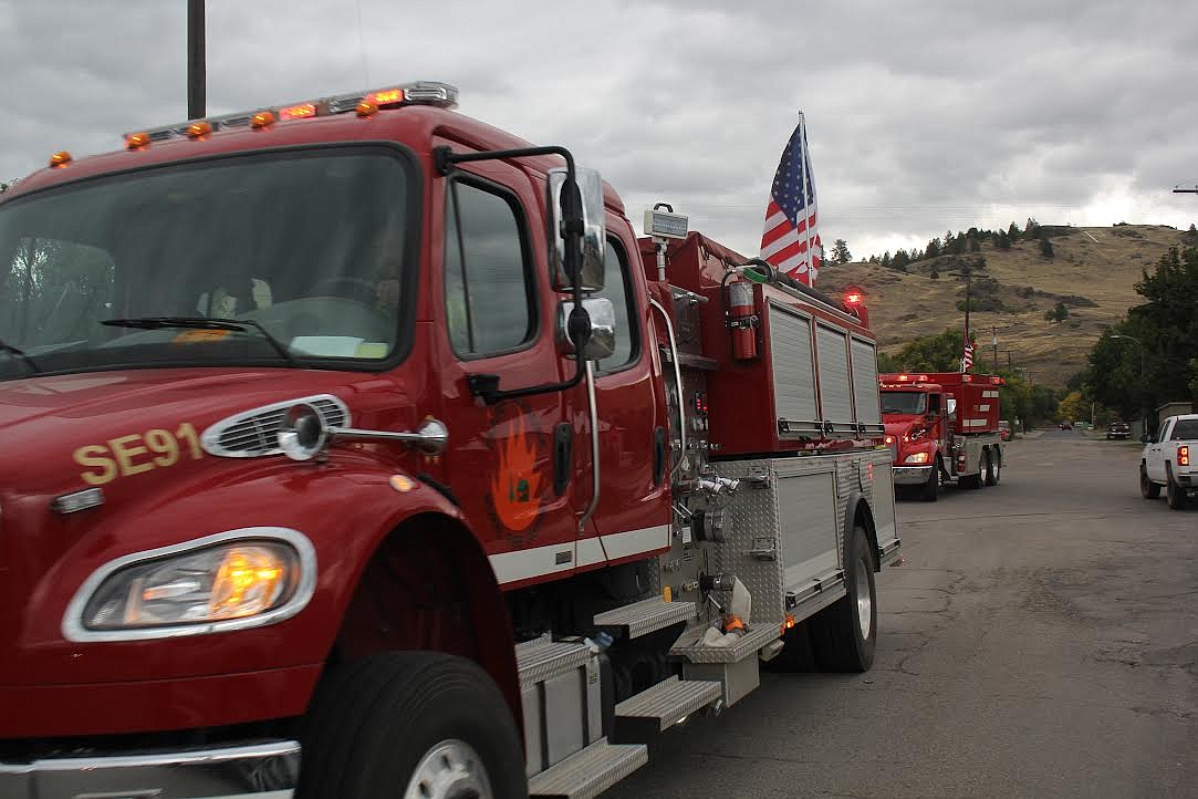 Plains-Paradise Rural Fire Department members and trucks participated in a parade last Saturday to honor first responders who perished in the Sept. 11, 2001, terrorist attacks on the United States. (Monte Turner/Valley Press)