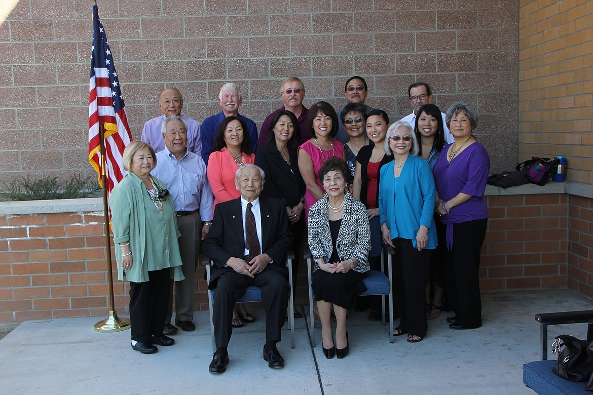 Paul and Ginny Hirai with family members at the dedication of the Big Bend Community College Fine Arts Building on April 1, 2013. Front Row are Anita Nakamura, Paul Hirai, Ginny Hirai and Joy Huckle. Middle row are Brian Hirai, Nancy Hirai, Susan Hirai, Patty Laughery, Phyllis Hirai, Denise Hirai, Stacie Hirai and Gail Stinnett. Back row are Michael Hirai, Ed Parsons, John Laughery, Mark Hirai and Ron Stinnett.