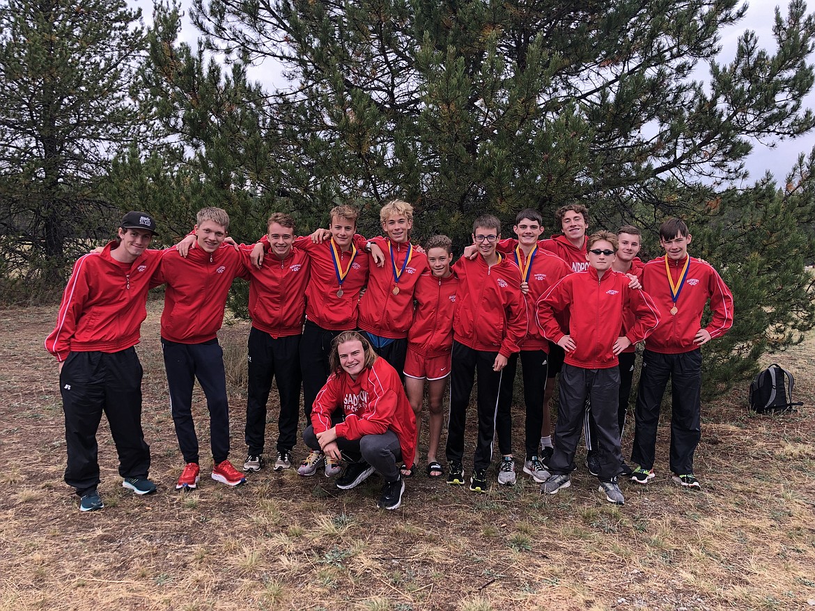 The first-place Sandpoint JV boys team poses for a photo on Saturday.