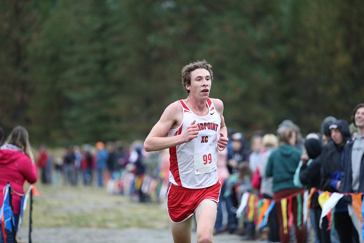 Isaac Babin nears the finish of the JV race.